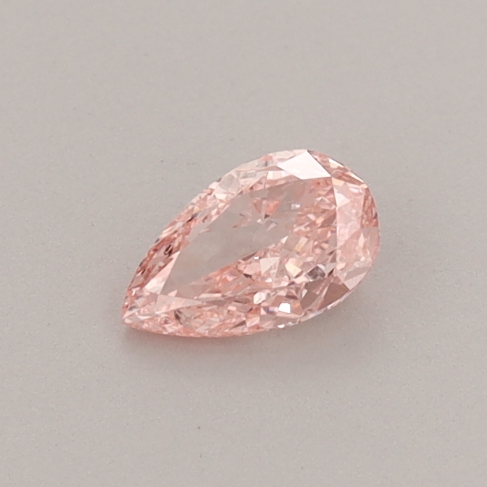 Actual 0.31 carat Fancy Vivid Pink Pear lab-grown diamond