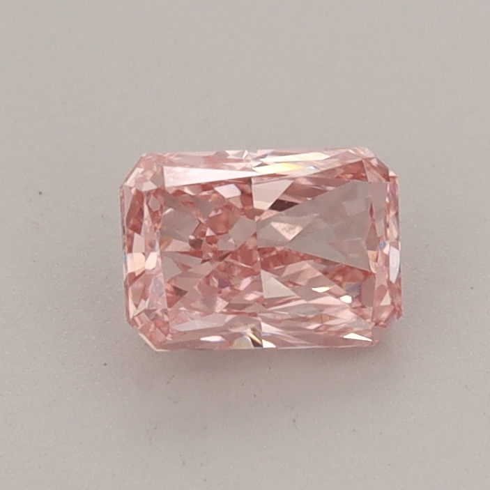 Actual 0.6 carat Intense Pink Radiant lab-grown diamond