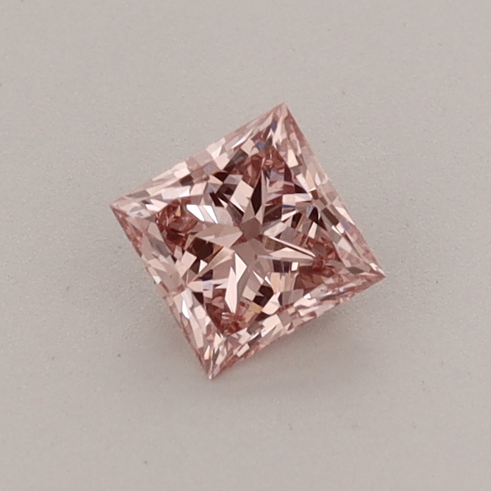 Actual 0.39 carat Fancy Intense Pink Princess lab-grown diamond