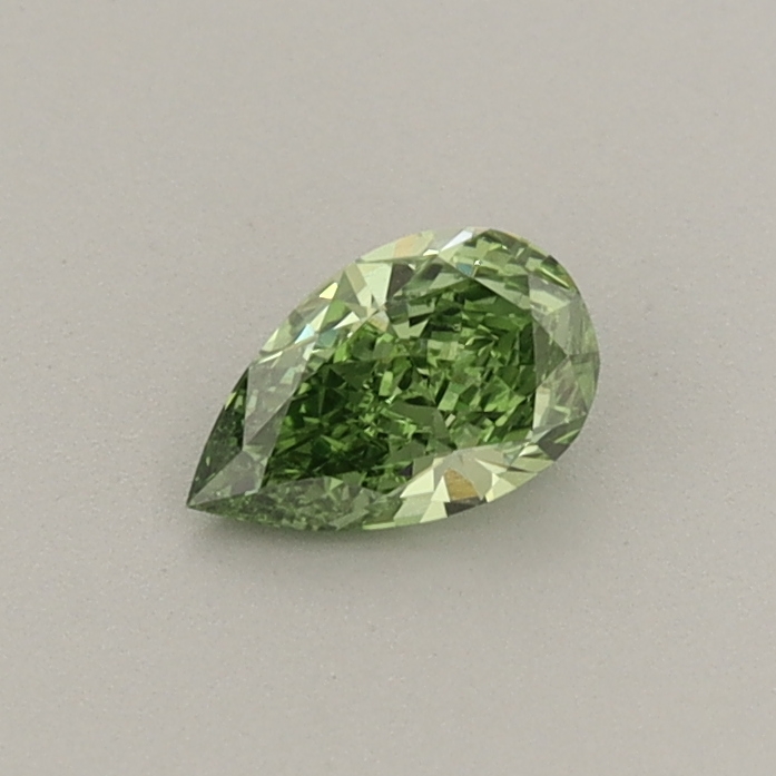 Actual 0.27 carat Fancy Vivid Green Pear lab-grown diamond