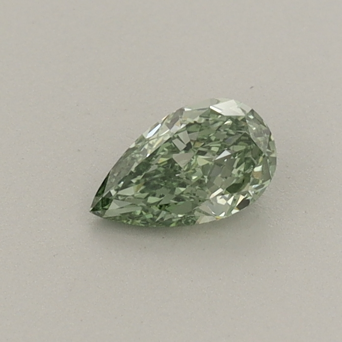 Actual 0.28 carat Fancy Vivid Green Pear lab-grown diamond