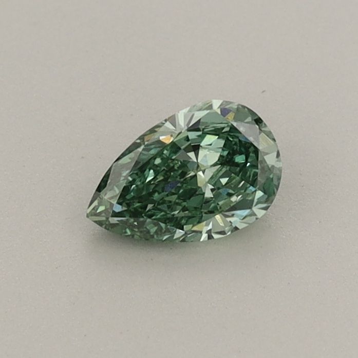 Actual 0.31 carat Fancy Vivid Green Pear lab-grown diamond