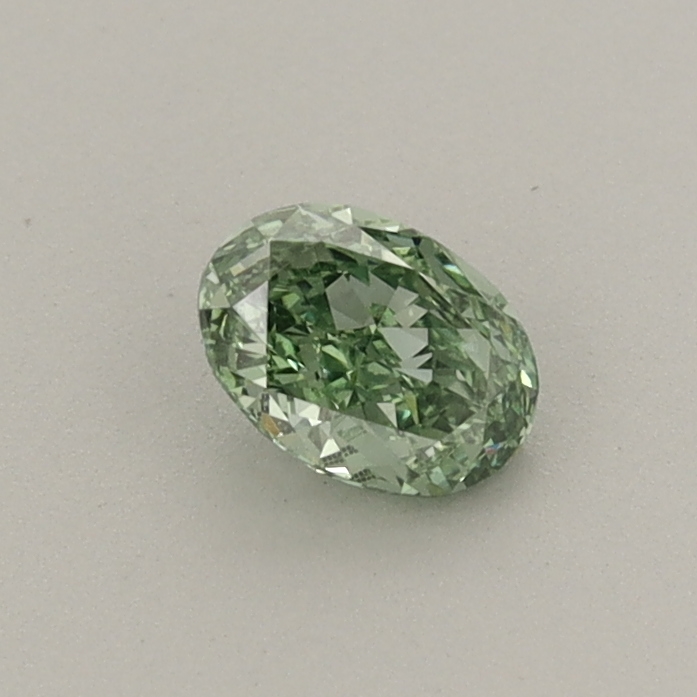 Actual 0.34 carat Fancy Vivid Green Oval lab-grown diamond