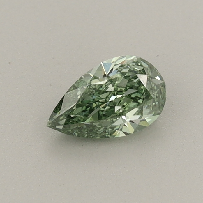 Actual 0.36 carat Fancy Vivid Green Pear lab-grown diamond