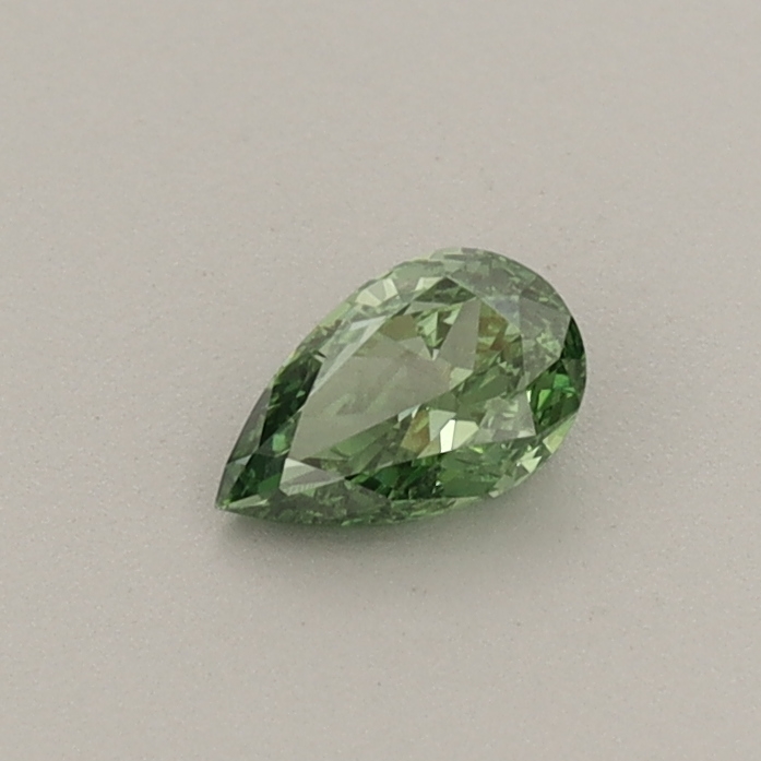 Actual 0.24 carat Fancy Vivid Green Pear lab-grown diamond