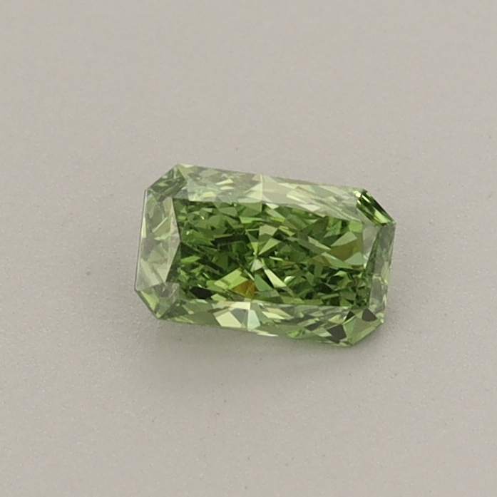 Actual 0.26 carat Fancy Vivid Green Radiant lab-grown diamond