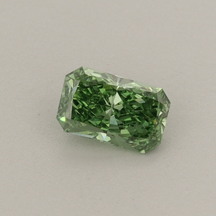 Actual 0.26 carat Fancy Vivid Green Radiant lab-grown diamond