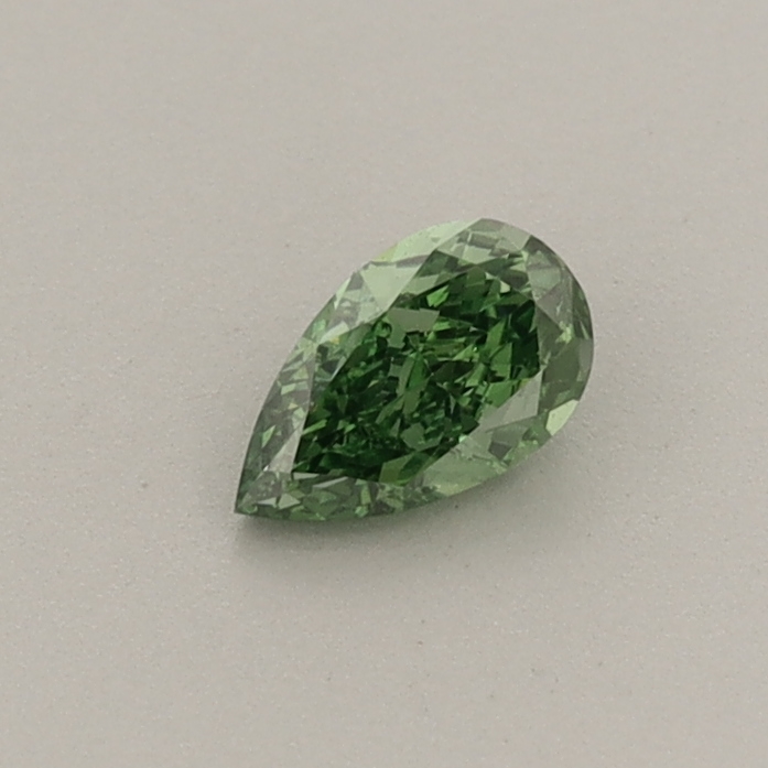 Actual 0.26 carat Fancy Vivid Green Pear lab-grown diamond