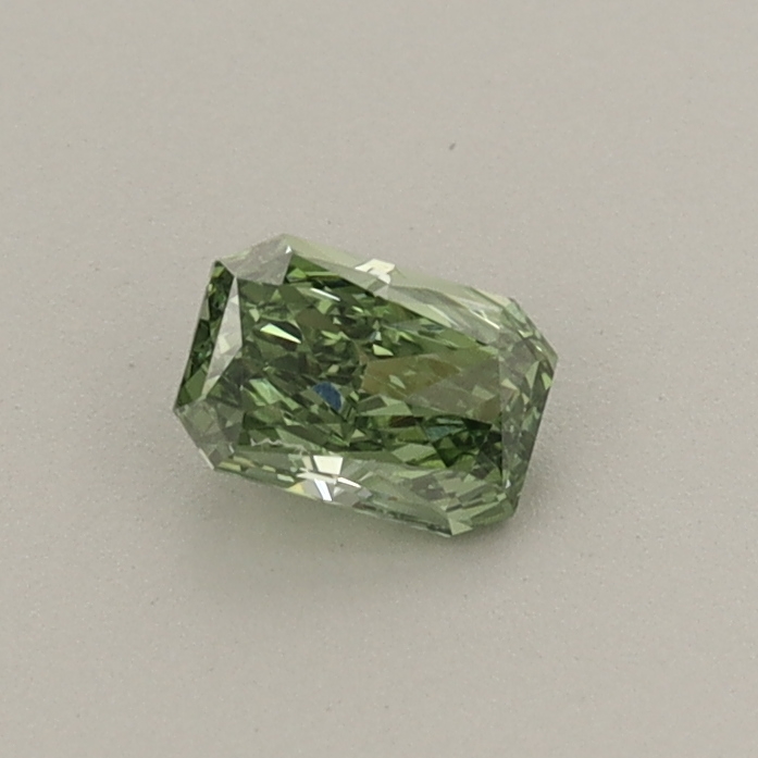 Actual 0.29 carat Fancy Vivid Green Radiant lab-grown diamond