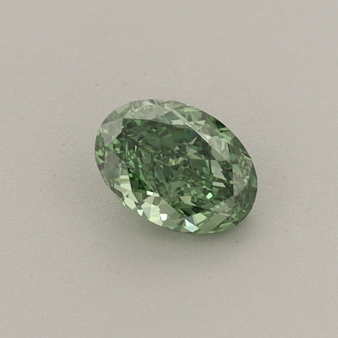 Actual 0.3 carat Fancy Vivid Green Oval lab-grown diamond