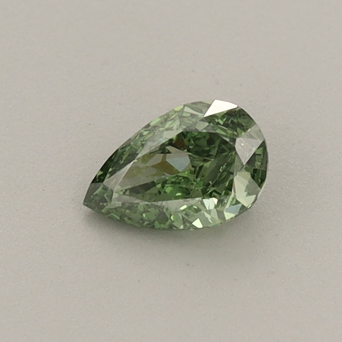 Actual 0.31 carat Fancy Vivid Green Pear lab-grown diamond