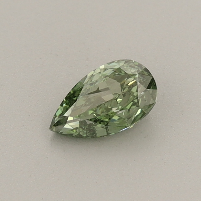 Actual 0.32 carat Fancy Vivid Green Pear lab-grown diamond