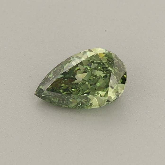 Actual 0.31 carat Fancy Vivid Green Pear lab-grown diamond