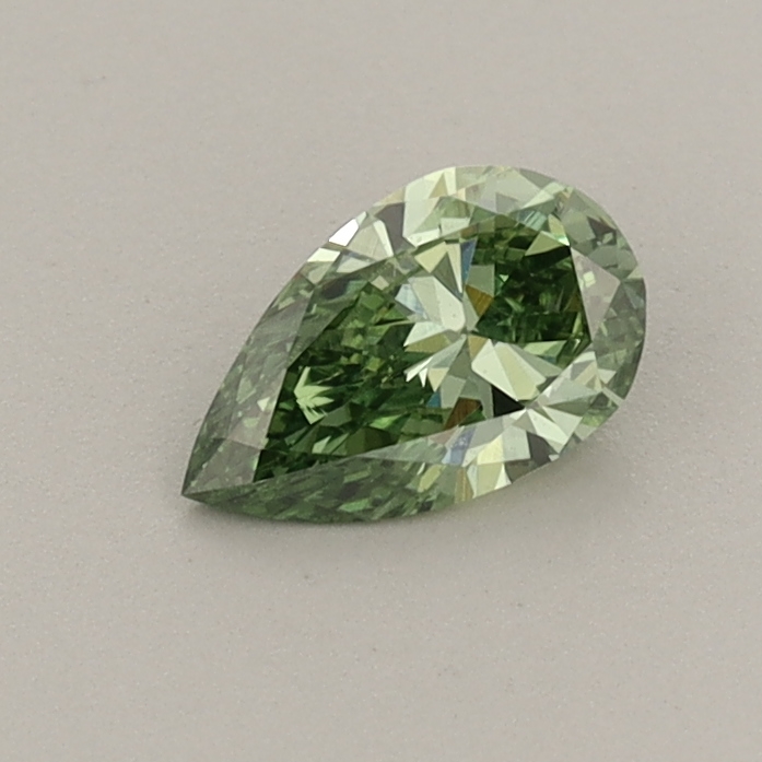 Actual 0.35 carat Fancy Vivid Green Pear lab-grown diamond