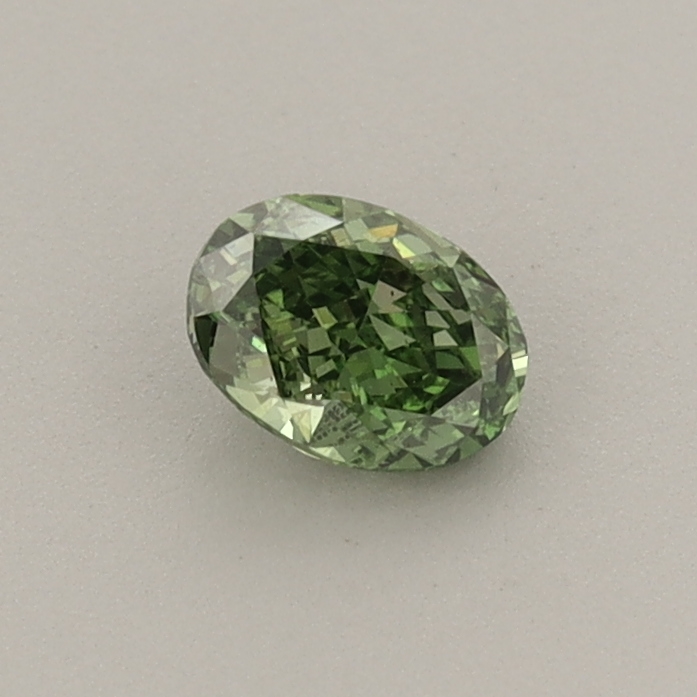 Actual 0.34 carat Fancy Vivid Green Oval lab-grown diamond