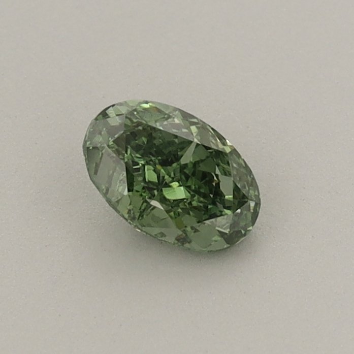 Actual 0.36 carat Fancy Vivid Green Oval lab-grown diamond