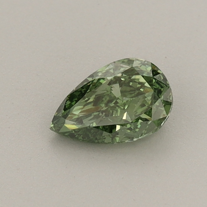 Actual 0.4 carat Fancy Vivid Green Pear lab-grown diamond