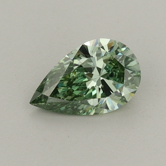 Actual 0.42 carat Fancy Vivid Green Pear lab-grown diamond