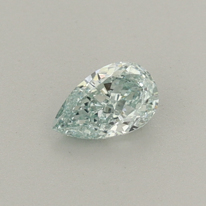 Actual 0.27 carat Fancy Intense Green Pear lab-grown diamond
