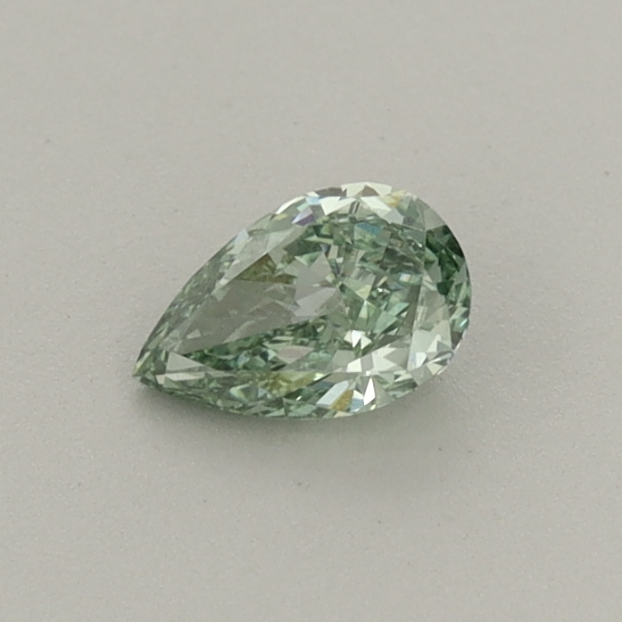 Actual 0.31 carat Fancy Vivid Green Pear lab-grown diamond