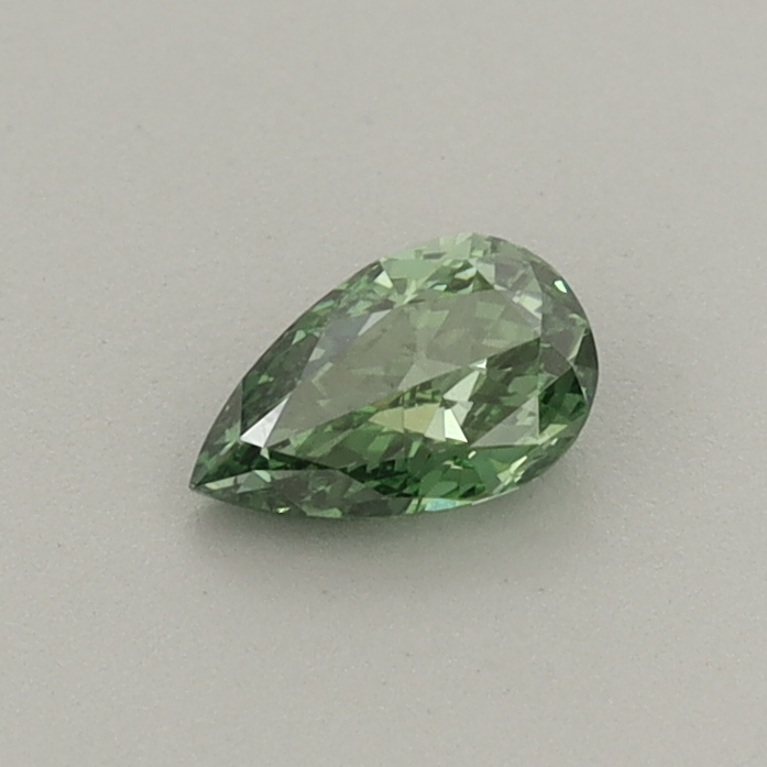 Actual 0.29 carat Fancy Vivid Green Pear lab-grown diamond