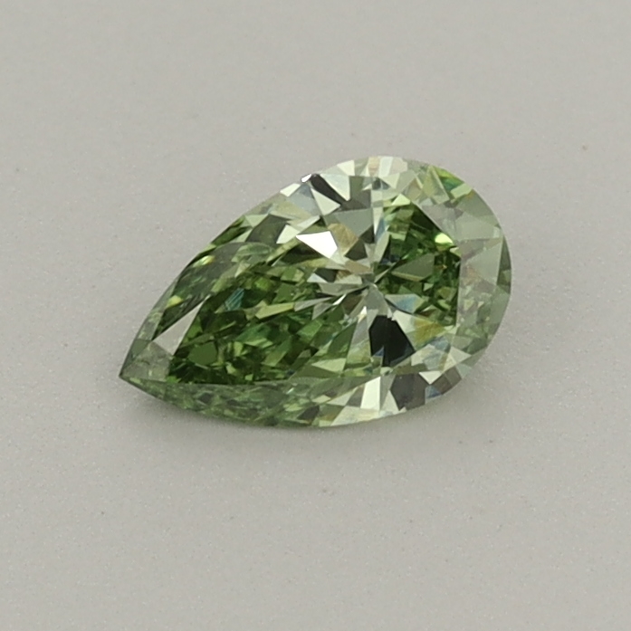 Actual 0.31 carat Fancy Vivid Green Pear lab-grown diamond