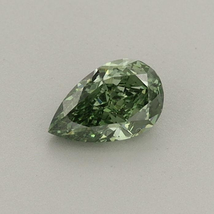 Actual 0.33 carat Fancy Vivid Green Pear lab-grown diamond