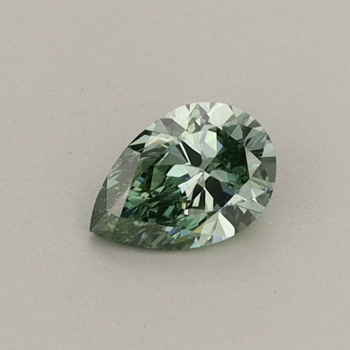 Actual 0.3 carat Fancy Vivid Green Pear lab-grown diamond