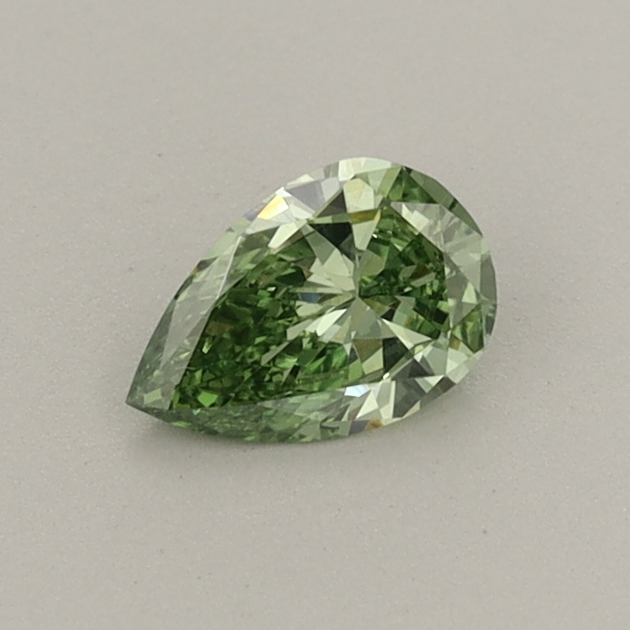 Actual 0.3 carat Fancy Vivid Green Pear lab-grown diamond