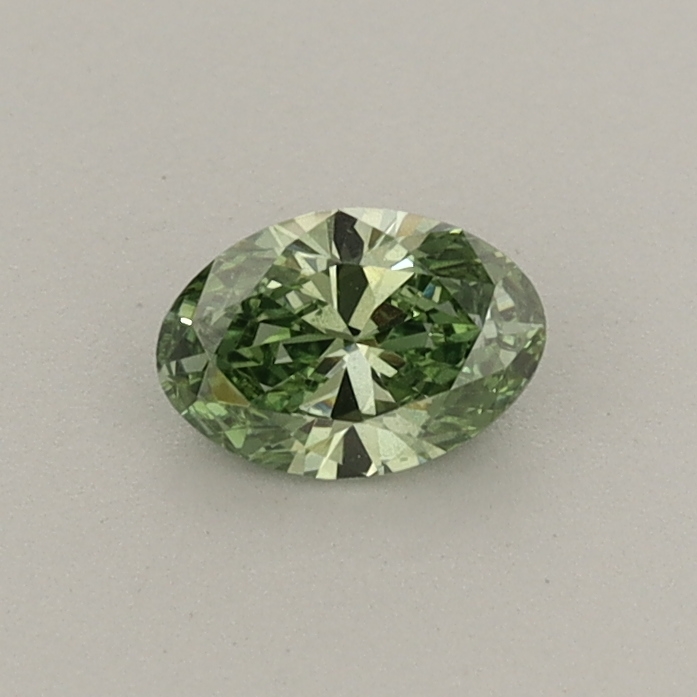 Actual 0.3 carat Fancy Vivid Green Oval lab-grown diamond