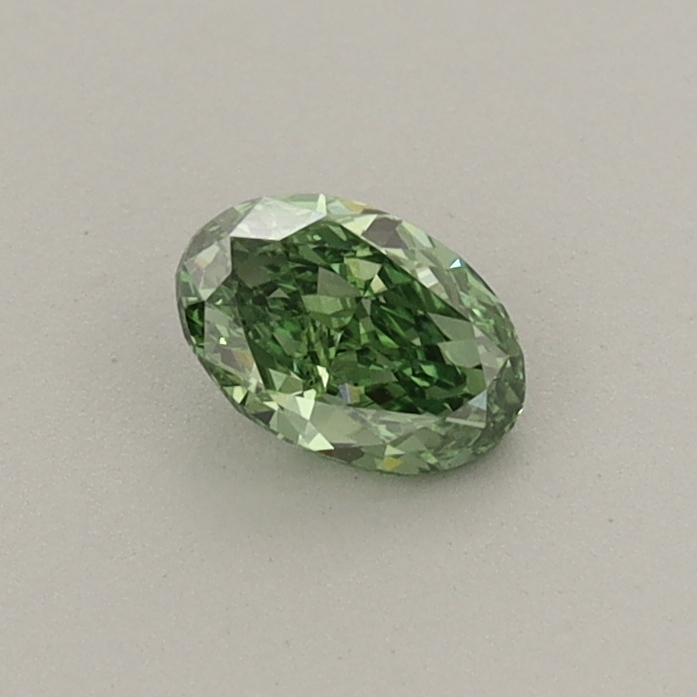 Actual 0.31 carat Fancy Vivid Green Oval lab-grown diamond