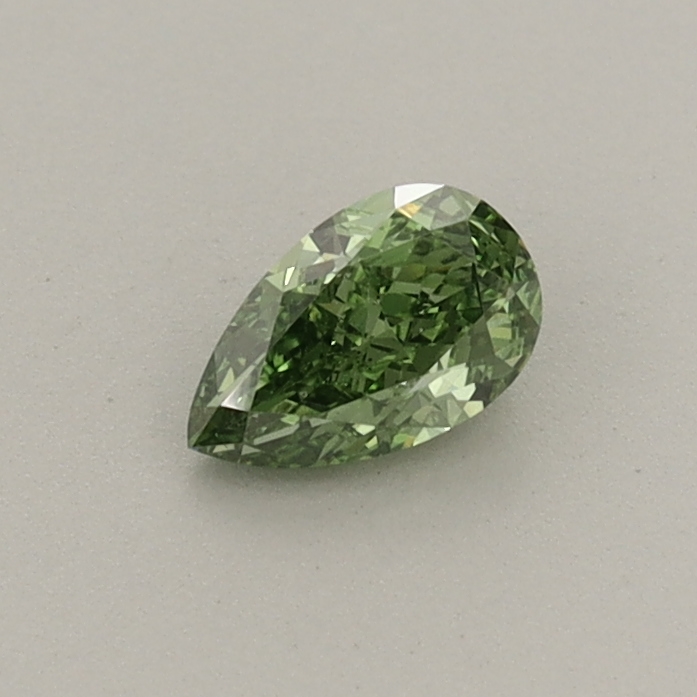 Actual 0.32 carat Fancy Vivid Green Pear lab-grown diamond