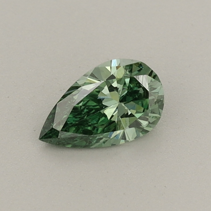 Actual 0.32 carat Fancy Vivid Green Pear lab-grown diamond