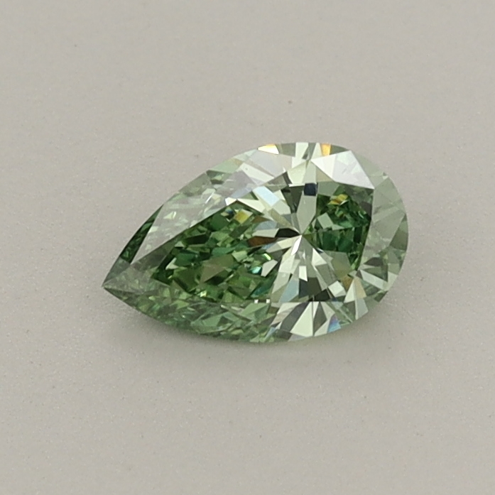 Actual 0.32 carat Fancy Vivid Green Pear lab-grown diamond