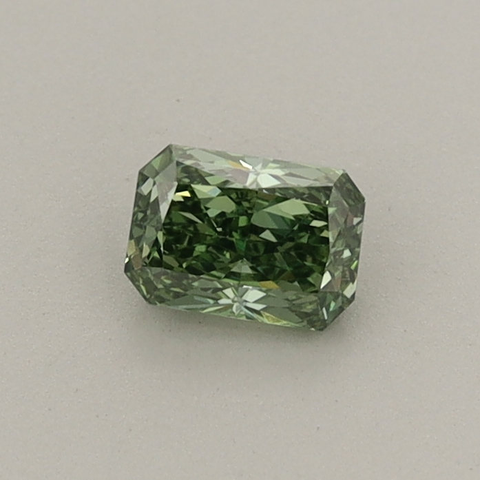 Actual 0.33 carat Fancy Vivid Green Radiant lab-grown diamond