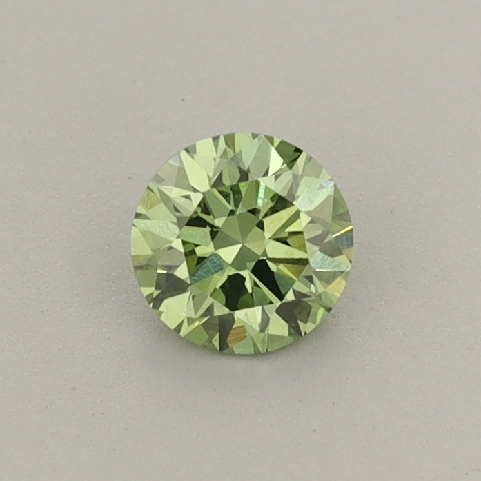 Actual 0.34 carat Fancy Vivid Green Round lab-grown diamond