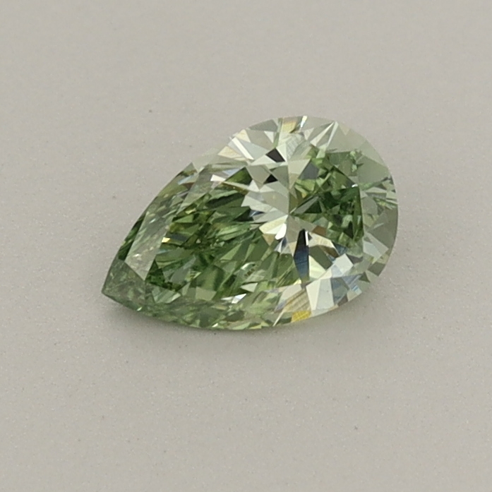 Actual 0.34 carat Fancy Vivid Green Pear lab-grown diamond