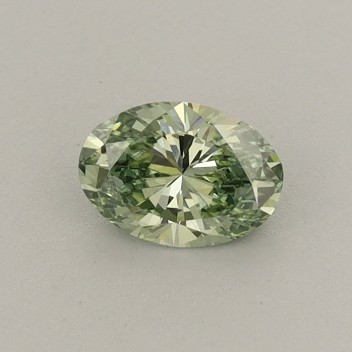 Actual 0.35 carat Fancy Vivid Green Oval lab-grown diamond