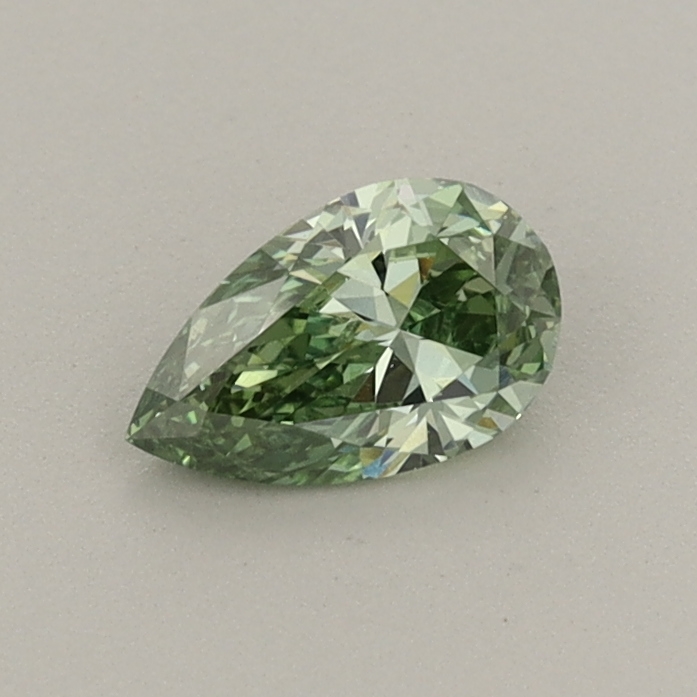 Actual 0.35 carat Fancy Vivid Green Pear lab-grown diamond