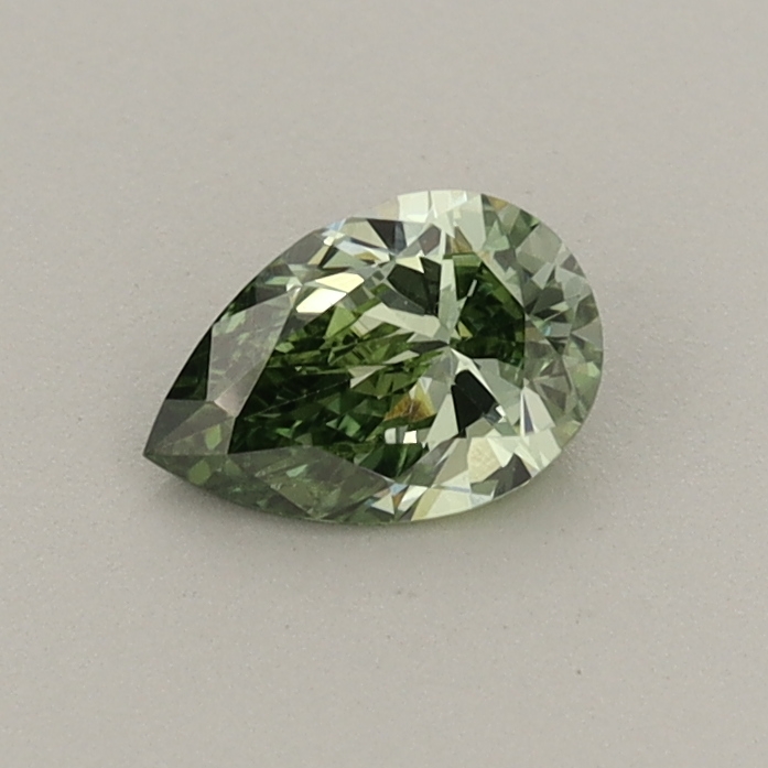 Actual 0.36 carat Fancy Vivid Green Pear lab-grown diamond