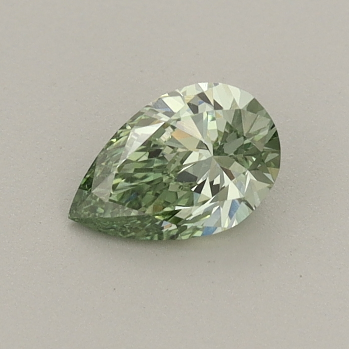 Actual 0.4 carat Fancy Vivid Green Pear lab-grown diamond
