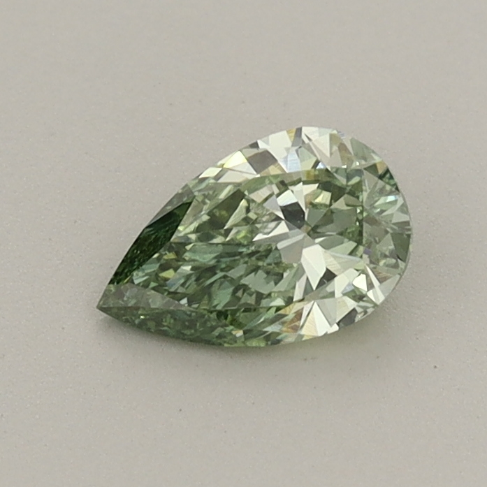 Actual 0.4 carat Fancy Vivid Green Pear lab-grown diamond