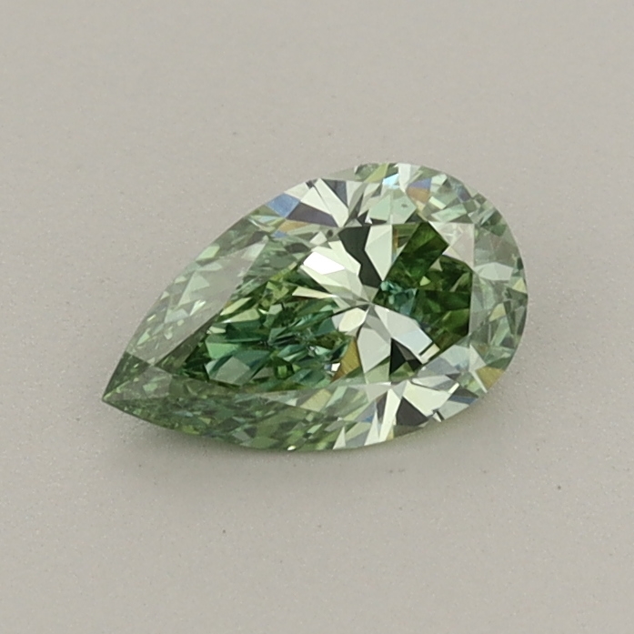 Actual 0.4 carat Fancy Vivid Green Pear lab-grown diamond