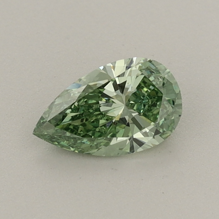 Actual 0.43 carat Fancy Vivid Green Pear lab-grown diamond