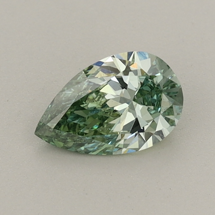 Actual 0.46 carat Fancy Vivid Green Pear lab-grown diamond