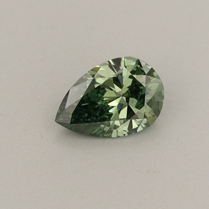 Actual 0.23 carat Fancy Vivid Green Pear lab-grown diamond