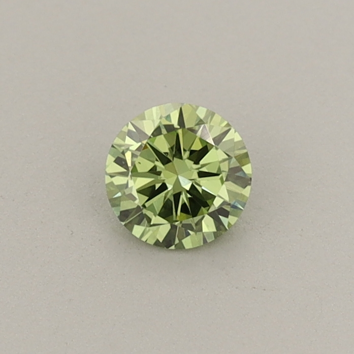 Actual 0.23 carat Fancy Vivid Green Round lab-grown diamond