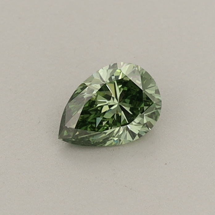 Actual 0.25 carat Fancy Vivid Green Pear lab-grown diamond