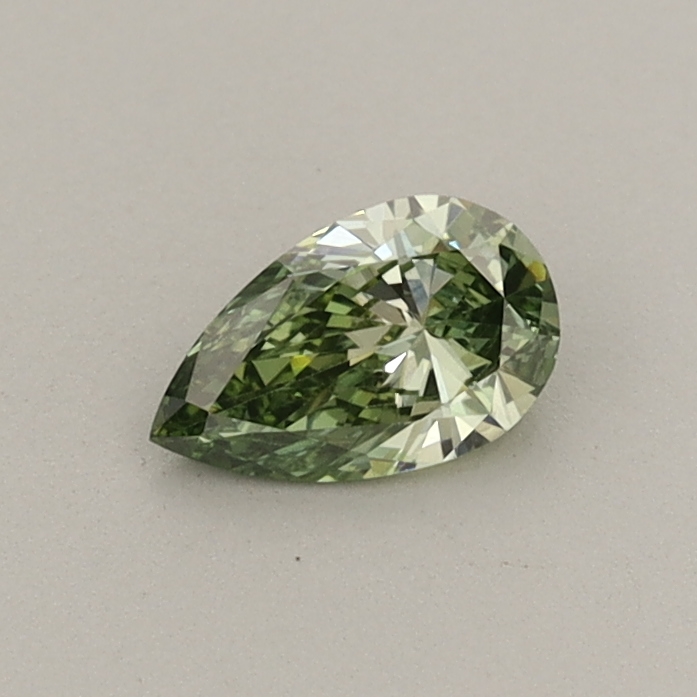 Actual 0.26 carat Fancy Vivid Green Pear lab-grown diamond