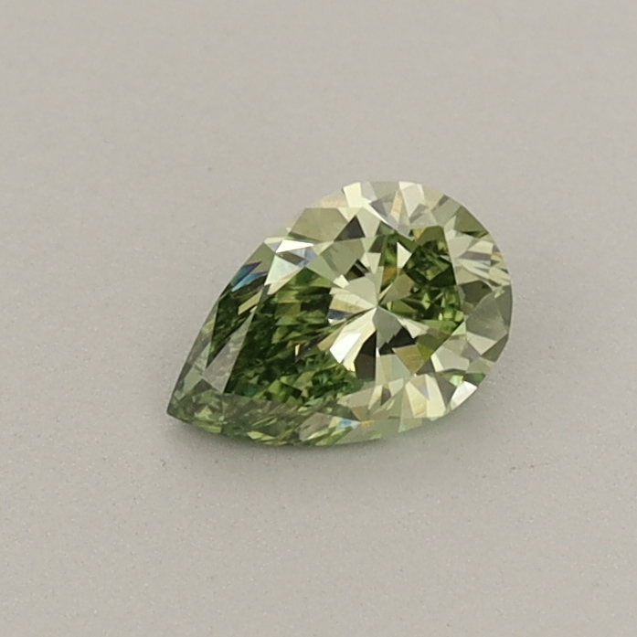 Actual 0.29 carat Fancy Vivid Green Pear lab-grown diamond